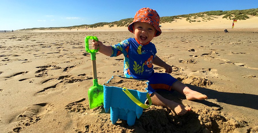 toddler building sandcastle Camber Sands