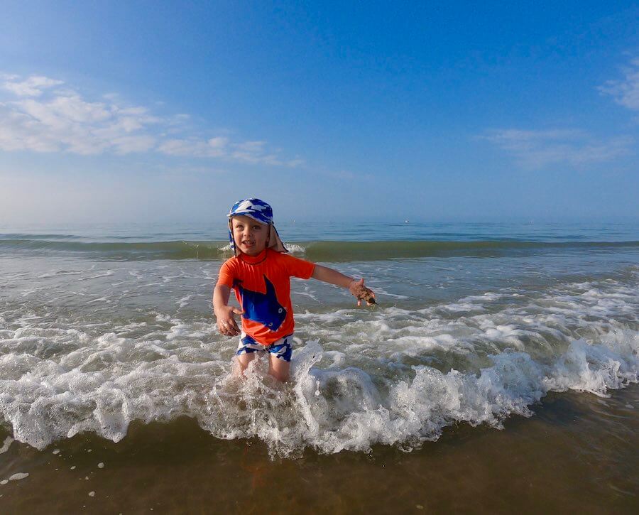 Arthur playing in the surf