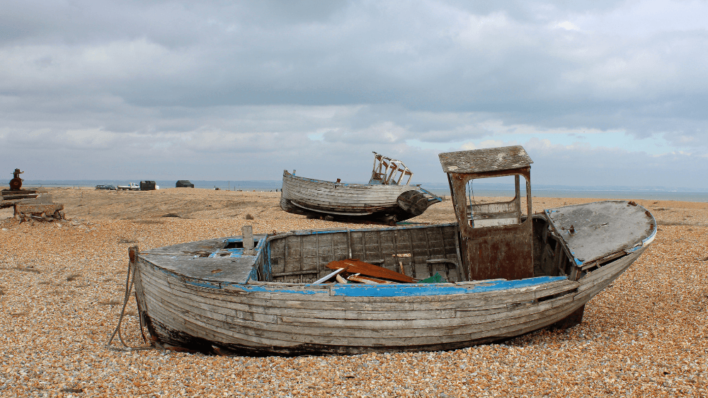 Photo of Dungeness Beach and its abandoned boats