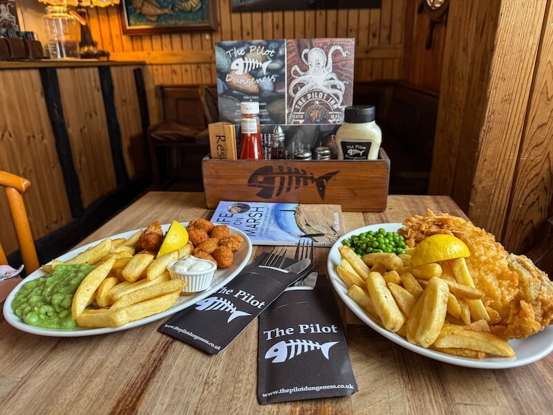 Plate of fish and chips at a Dungeness pub The Pilot. One of many reasons to visit Dungeness