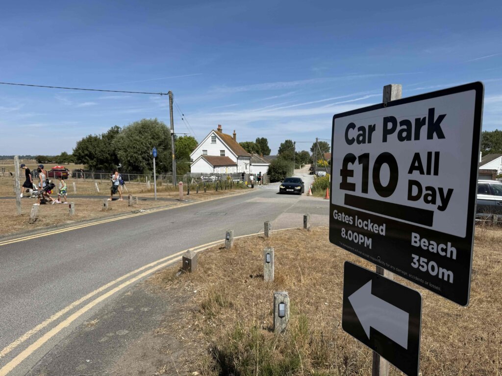 Poundfield Farm Lane car park sign, Camber: £10 all day parking, beach 350m