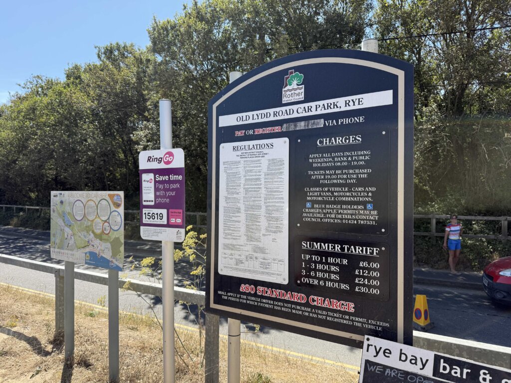 Old Lydd Road car park sign at Camber Sands with RingGo zone 15619 and summer charges