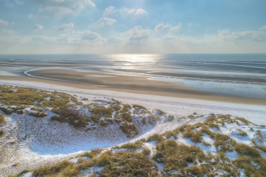 snow covered beach at camber sands