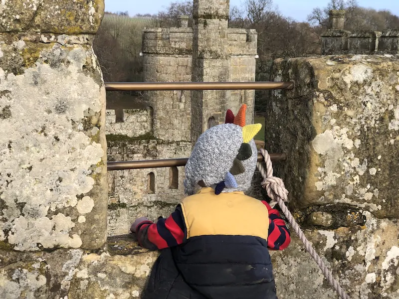 Children exploring Bodiam Castle on an October half-term Camber Sands day trip
