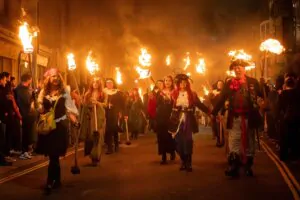 Torchlit procession during the Sussex Bonfire Season with costumes and drums