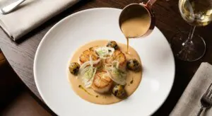 Rye Bay Scallop week 2026 menu at No.50 Seared Scallops Shaved Fennel, Shellfish Bisque Velouté, Seaweed Potatoes